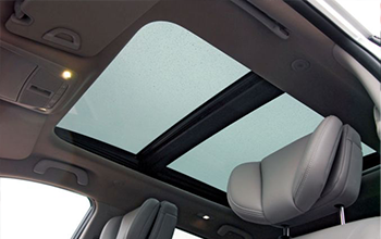 Technician working on a side car window